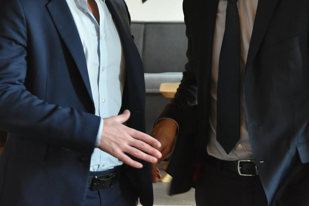 business people shaking hands