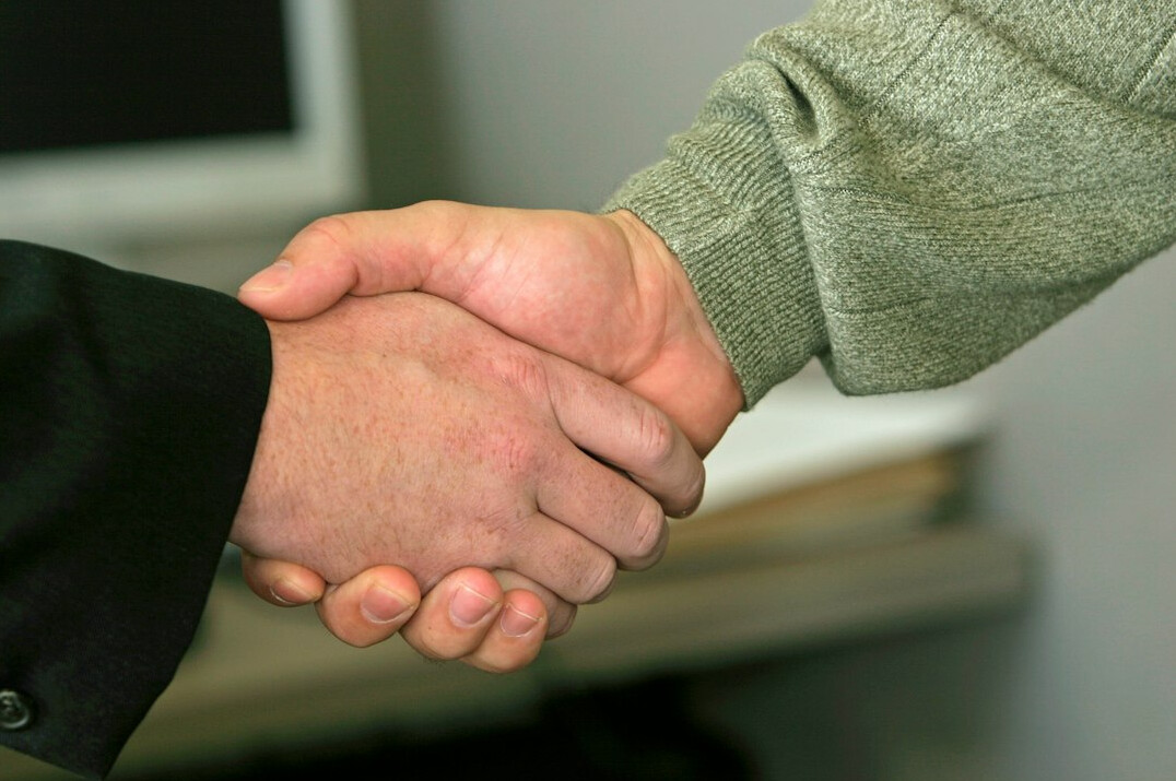business people shaking hands